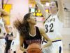 Port Huron's Kelsie Chapman looks to shoot with Northern's Bree Bauer playing defense on Dec. 9, 2016.