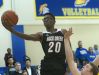 Rock Creek guard-forward Ravaun Bailey drives past CAI forward Riley Linnehan on the way to a basket. 09 December 2016