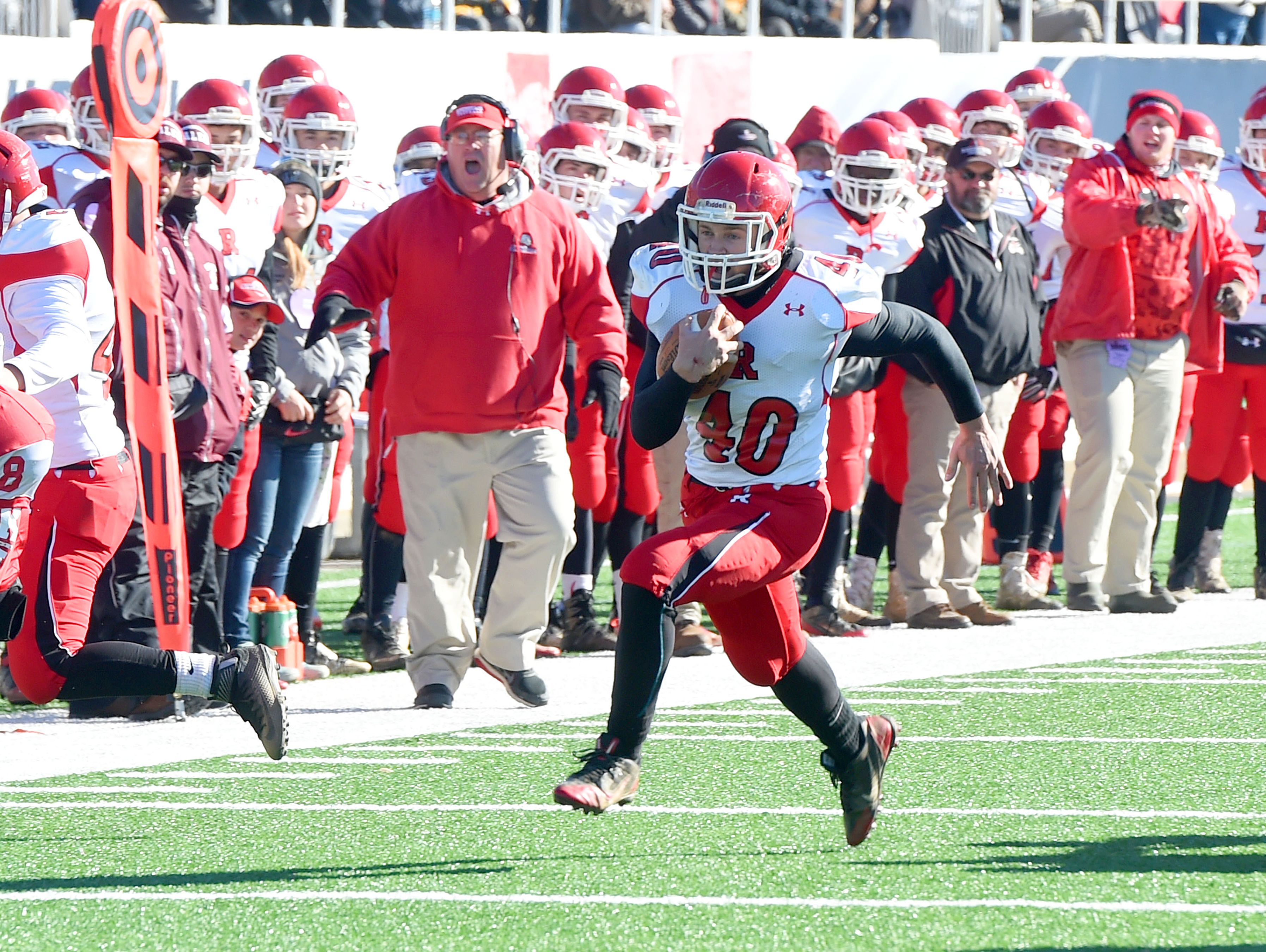 Riverheads' Harrison Schaefer breaks away with the ball and runs the ball towards the end zone for a touchdown during the Group 1A state championship football game played in Salem on Saturday, Dec. 10, 2016.
