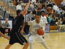 Lee High's Jarvis Vaughan (10) drives the lane during Friday night's game against Harrisonburg at Paul Hatcher Gym.