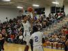 Lee High's Manny Johnson puts up a shot during the first half of Friday's boys basketball game between Lee and Harrisonburg at Paul Hatcher Gym.