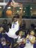 IMG Academy's Emmitt Williams with a slam (Photo: Kinfay Moroti/news-press.com)