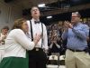 Josh Speidel gets a hug from his mother Lisa as his father Dave looks on as he is introduced before the start of the University of Vermont's game against Stony Brook, Jan. 30, 2016.