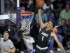 Trevon Duval of IMG Academy dunks in the first quarter against Montverde Academy in the semifinals of the 44th Annual Culligan City of Palms Classic at Suncoast Credit Union Arena in south Fort Myers.