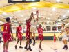 Josh Moore, 21, of Lansing Christian sinks a jump shot over a Sexton defender early in the 4th quarter of their game Tuesday December 20, 2016 at Lansing Christian High.