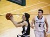 Dansville sophomore Hayden Voss connects from the pain against Williamston's Sy Barnett Wednesday, Dec. 21, 2016, at Williamston.