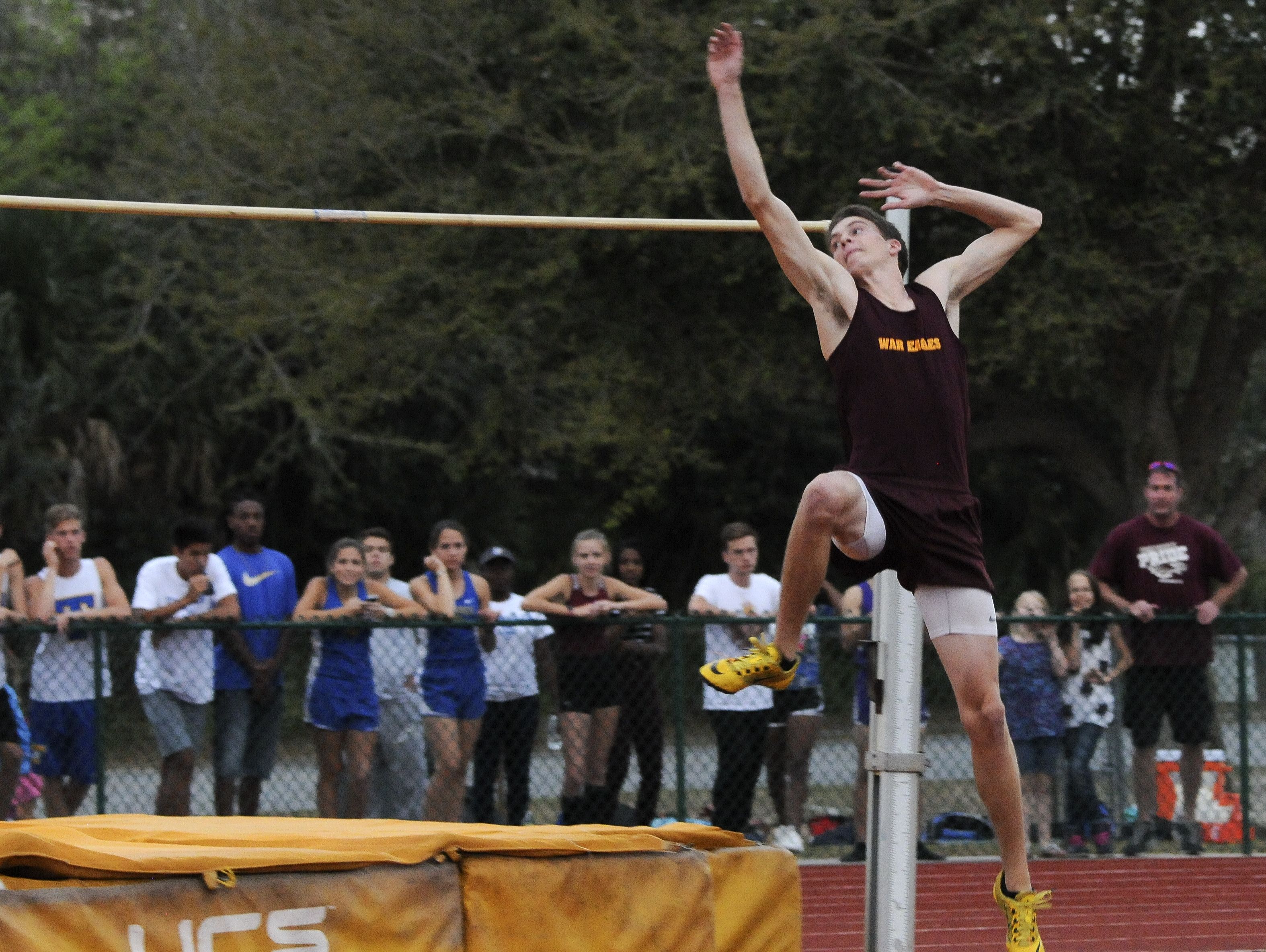 Tristan Schultheis clears the bar during the Astronaut Invitational Track and Field meet in Titusville.