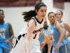 Wilmington Friends guard, Margaret Sullivan drives to the basket for the first points of the game against Cape Henlopen.