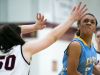 Cape Henlopen guard Dania Cannon (right) drives around Wilmington Friends' Natalie DePaulo and sinks the basket for two.
