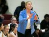 Wilmington Friends coach Carolyn Connors gestures to her players from courtside.