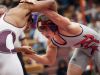 Isaac Matthews of Ketcham and Tyrese Marbury of Ossining grapple for the 160-pound title at the 51st Annual Mid-Hudson Wrestling Invitational at Arlington High School on Wednesday.