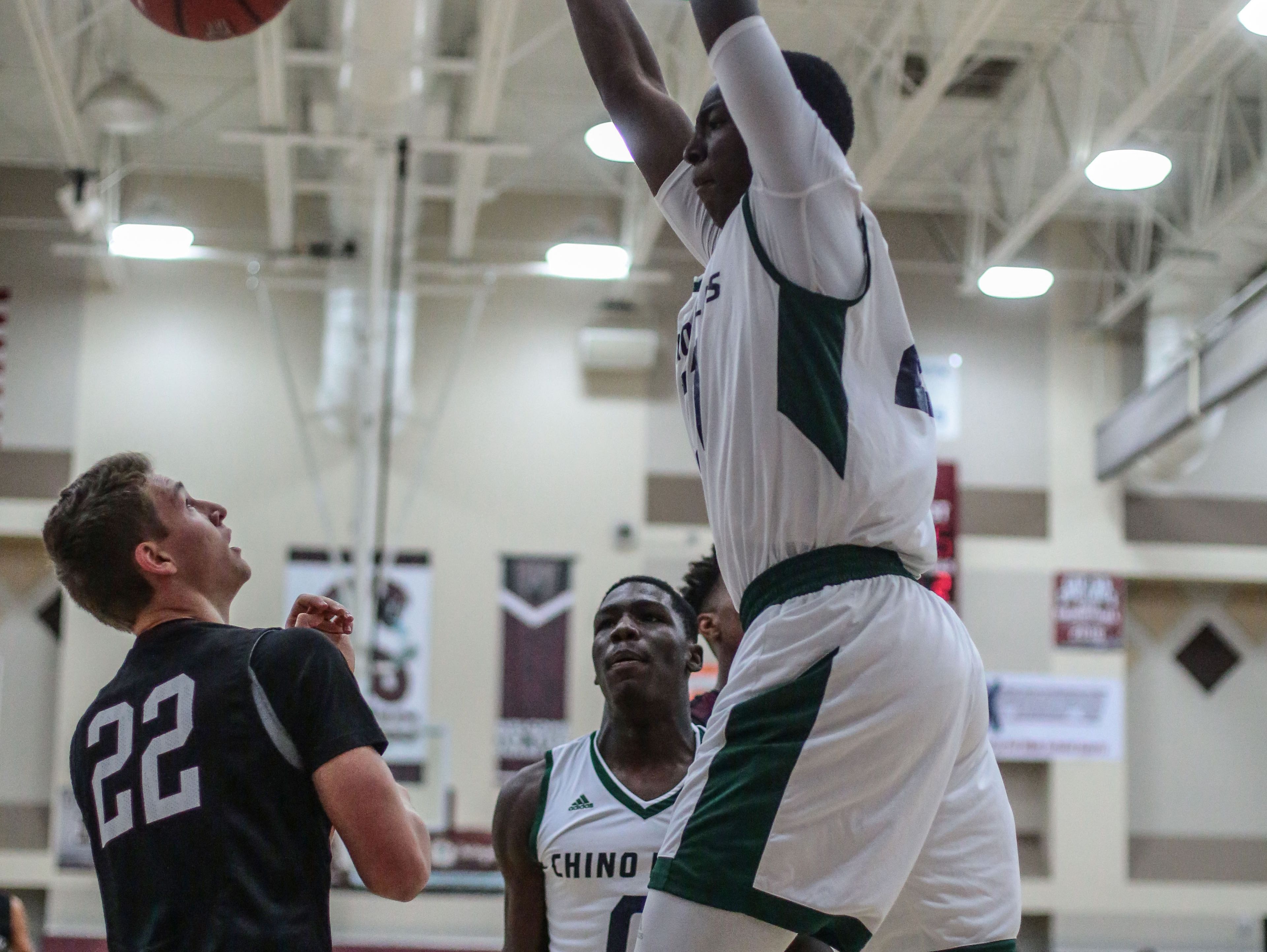 Chino Hills Onyeka Okongwu dunks the ball against Woodcreek on Wednesday, December 28, 2016 during the Rancho Mirage Holiday Invitational at Rancho Mirage High School.