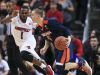 Virginia's Kyle Guy drives past Louisville's Tony Hicks as Guy had nine points in 19 minutes of play in the Cavaliers' win over the Cards 61-53 Wednesday night.