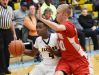 Sanford's Sean Williams (4) drives to the basket as Smyrna's Caleb Matthews defends.