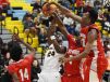 Sanford's Marcus McCollum (24) gets teamed up on by Smyrna players during Thursday action at the Slam Dunk to the Beach, held at Cape Henlopen.