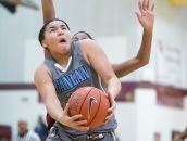 Monsignor Scanlan guard, Kateri Poole, gets around a defender as she drives to the basket.