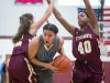 St. Elizabeth senior, Lexi Bromwell (left), and teammate Alexis Lee pressures Monsignor Scanlan guard, Kateri Poole, who tries to squeeze through the two defenders.