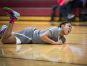 Monsignor Scanlan guard, Channel Williams, reacts as she hits the floor after colliding with a defender.