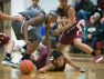 St. Elizabeth center, Alexis Lee, hits the floor as she dives for the loose ball loses to Monsignor Scanlan 53-44 in the Diamond State Clasin the second half.