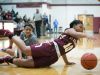 St. Elizabeth guard Sha'Nia Davis gets tripped up driving to the basket late in the game with no fouled called as they lose to Monsignor Scanlan with a final score of 53-44 in the Diamond State Classic at St. Elizabeths School.