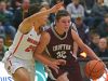 Crofton's Kelsey Sanger (32) drives past Washington's Jada Cunningham (32) during a rescheduled Edith Sanford Breast Center Girls Pentagon Classic game Thursday, Dec. 29, 2016, at Washington High School in Sioux Falls.