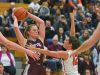 Crofton's Monica Arens (24) works to keep the ball from Washington's Kelsi Kearney (12) during a rescheduled Edith Sanford Breast Center Girls Pentagon Classic game Thursday, Dec. 29, 2016, at Washington High School in Sioux Falls.