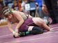 Tim Bova and Dennis Robin of Arlington High School face off for the 99-pound title at the 51st Annual Mid-Hudson Wrestling Invitational at Arlington High School on Wednesday.