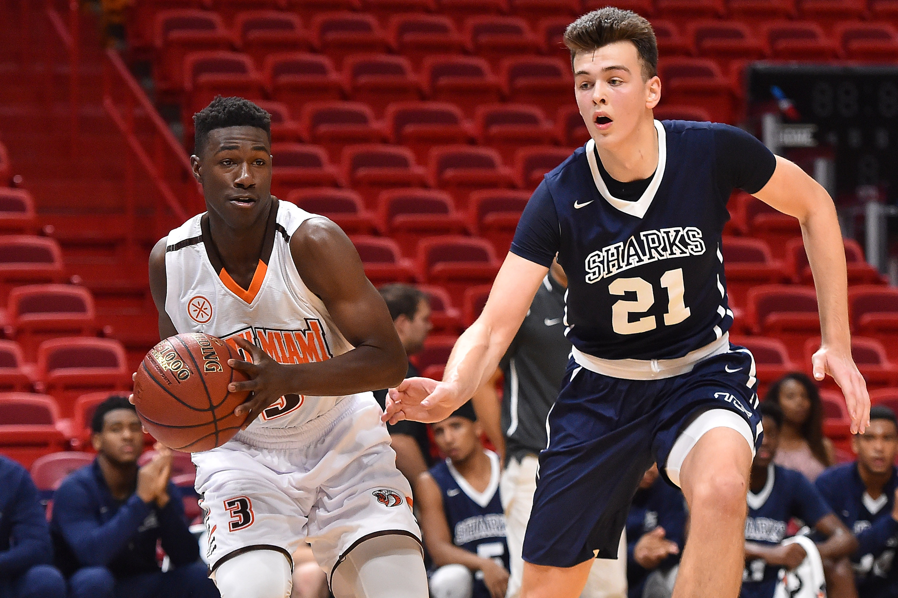 12/8/16 9:09:59 PM -- Miami, FL, U.S.A -- South Miami gaurd Kaevon Tyler (3) passes the ball around University School center Balsa Koprivica (21) during the first half of the HoopHall Miami Invitational. -- Photo by Jasen Vinlove-USA TODAY Sports Images, Gannett ORG XMIT: US 135835 hoophall 12/8/2016 [Via MerlinFTP Drop]