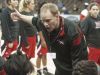 Manual Lady Crimsons head basketball coach Jeff Sparks huddles with his players. 10 March, 2016