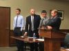 From left, defendant Michael Roth with his attorney James Sparrow, and Tanner Coolsaet with his attorney, Edward Holmberg, appear in Woodhaven District Court for their Aug. 15, 2016, preliminary exam.