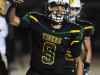 St. Xavier's Desmond Ridder (9) celebrates after scoring a touchdown against Male on Friday at St. Xavier High School. Nov. 18, 2016