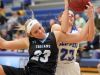 Cear Creek Amana's Karsyn Stratton and South Tama's Madison Rohach fight for a rebound during their game in Tiffin on Monday, Dec. 19, 2016.