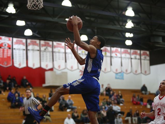 Palm Springs hosted Cathedral City in a boy's basketball game on Wednesday, January 4, 2016. Palm Springs won 56-52.