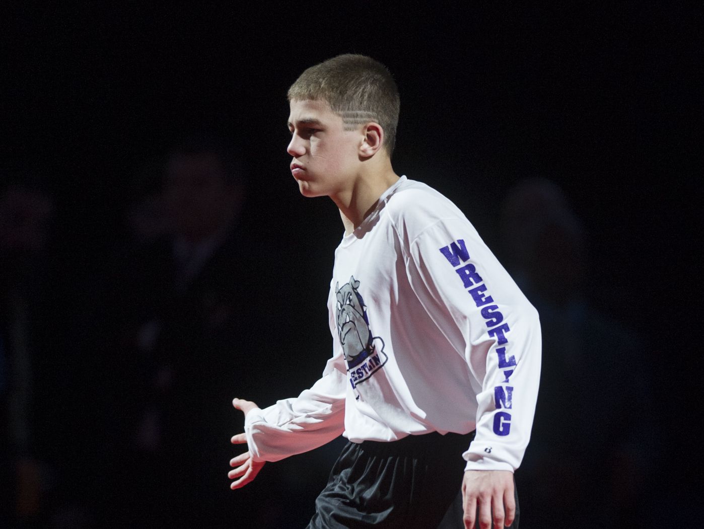 Brownsburg High School wrestler Tyler Mills is introduced during opening ceremonies in the 106-pound weight class. The 77th Annual IHSAA State Wrestling Finals at Bankers Life Fieldhouse in Indianapolis, Saturday, Feb. 21, 2015.