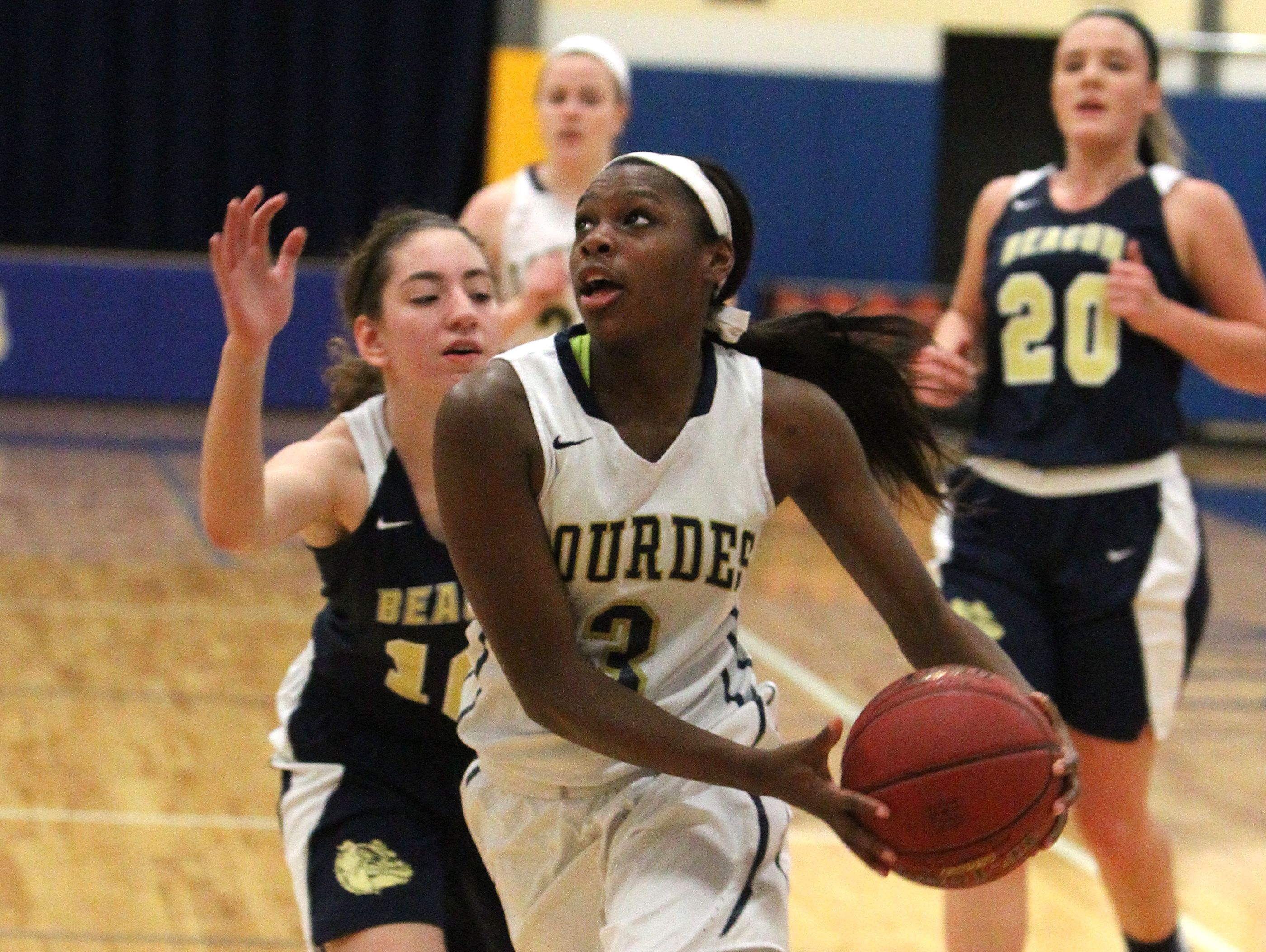 Rebecca Townes drives to the hoop in Lourdes' 86-31 win over Beacon on Tuesday.
