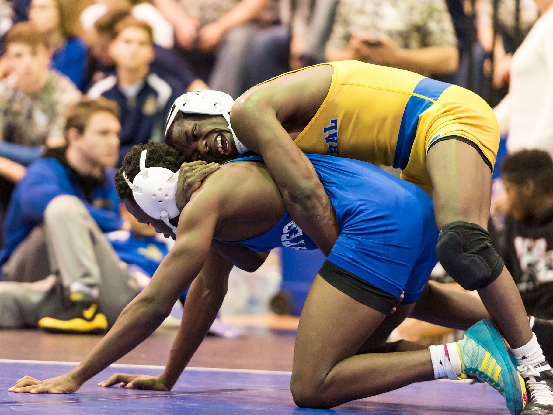 Rashad Stratton (top) of Sussex Central edges Jessey Muaka of Charter of Wilmington 4-3 in the 126-pound final at Saturday's Canal Classic at Middletown. The Golden Knights won the team title, and are currently ranked third in Division I.