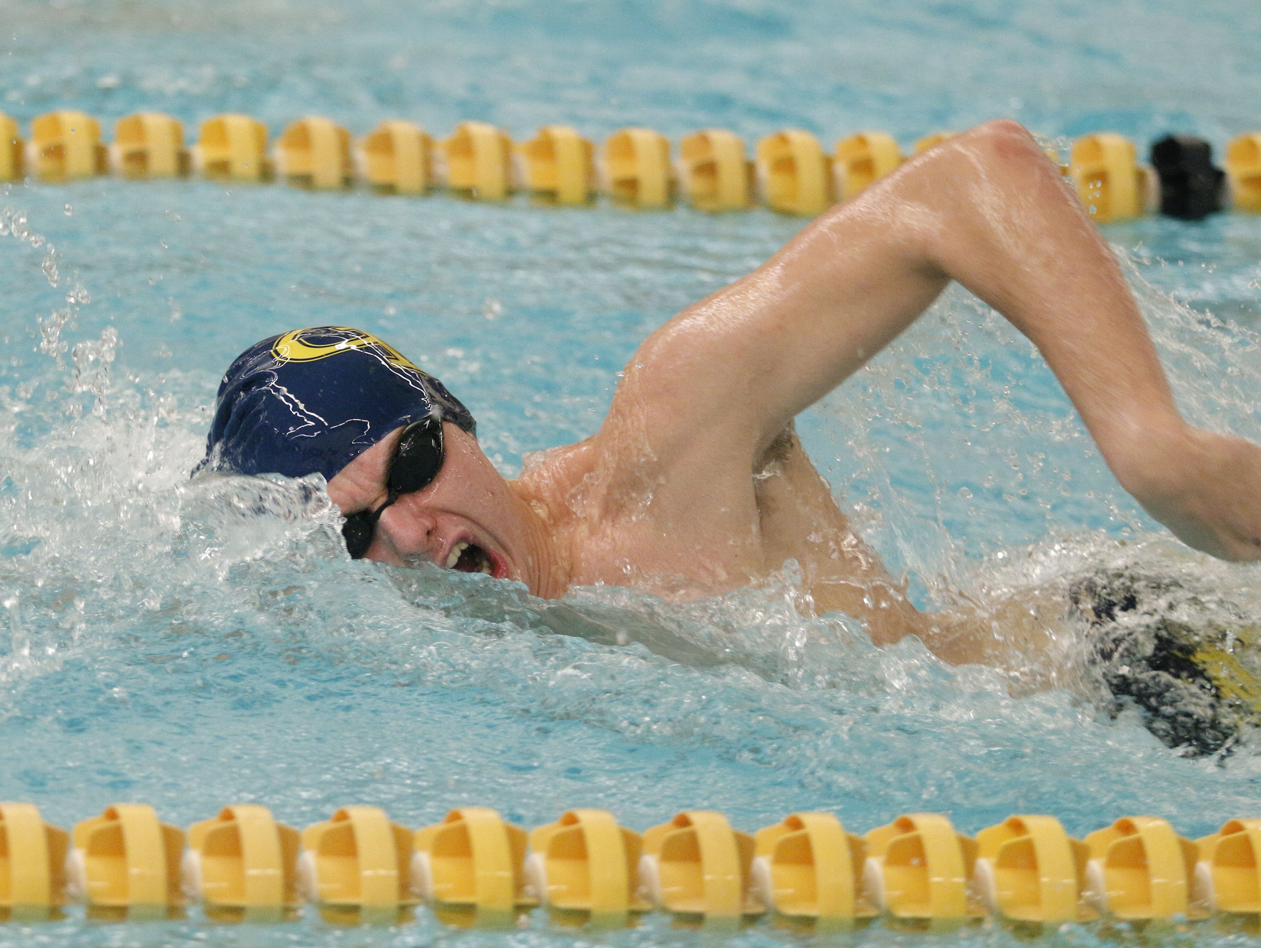 A Grand Ledge swimmer competes in the Waverly Relays Wednesday, Dec. 7, 2016, at Waverly High School.