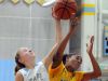Cape Henlopen's #10 Mallory Jones and Caesar Rodney's #21 Alissa Haith fight for the ball.