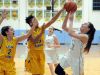 Cape Henlopen's #22 Sydney Pederson has a shot blocked by Caesar Rodney's #15 Kylie Kornegay-Lucas.