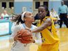Cape Henlopen's #3 Dania Cannon drives for basket as she is fouled by Caesar Rodney's #30 Destiny Johnson.