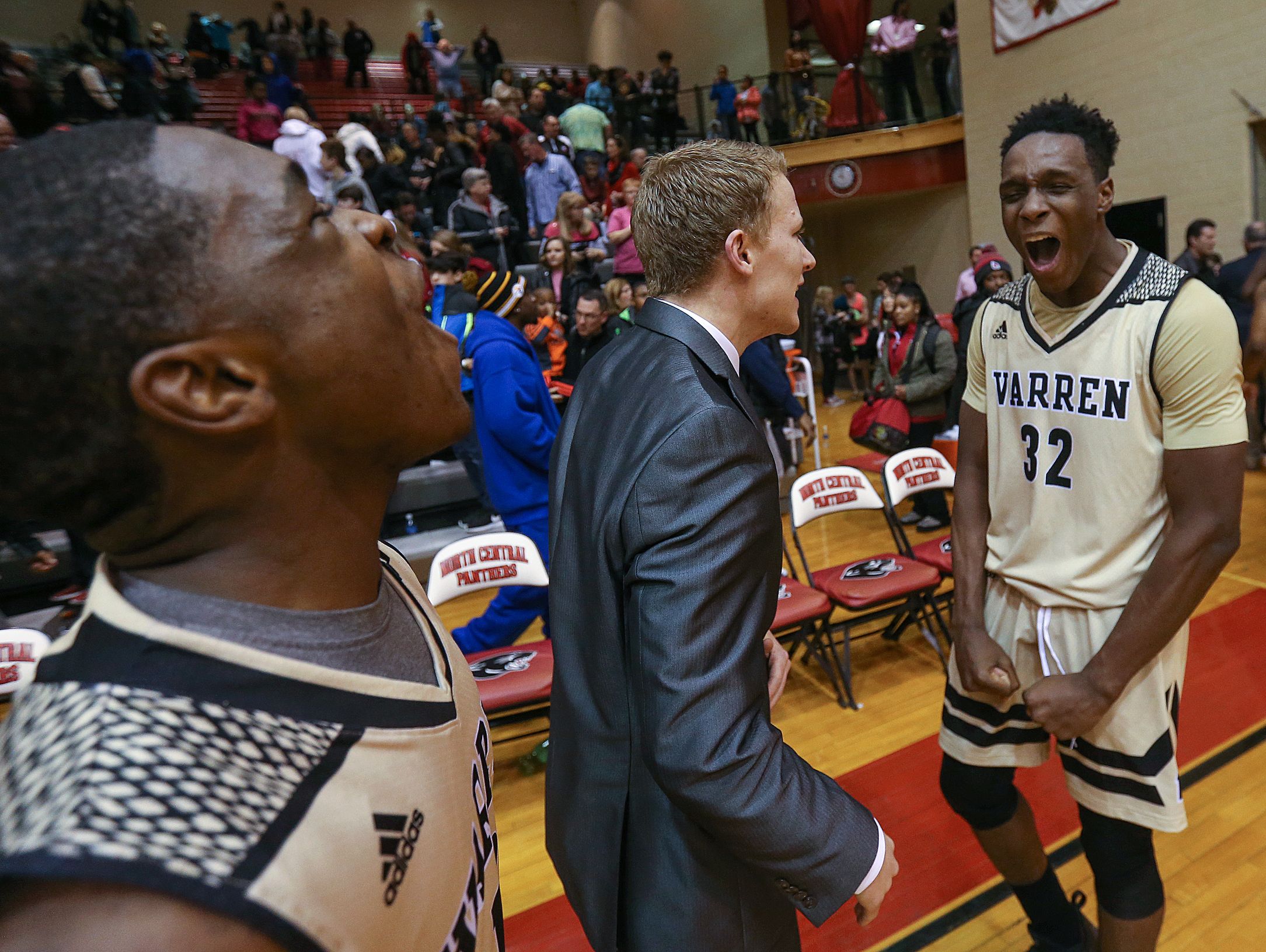 From left, Warren Central Warriors Dean Tate (10) and Warren Central Warriors Mack Smith (32) celebrate after defeating the North Central Panthers, 63-51, Friday. Warren Central broke a 14-game losing streak to North Central.