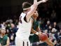 Hamilton junior Zach Anderson (24) tries to block a layup by Basha junior Bryan Baptiste (1) at Hamilton High School in Chandler on Friday, Jan. 27, 2017.