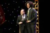 Jaelan Phillips receives his American Family Insurance Defensive Player of the Year award (Photo: AAG)