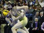 Two Rivers' Joey Bianchi, right, wrestles Luxemburg-Casco's Bryce Bosman during their WIAA Division 2 state championship match on Feb. 27, 2016, at the Kohl Center in Madison. The wrestlers met in the regional, sectional and state finals last year.