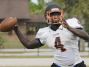 Cocoa High School QB Bruce Judson throws to an open receiver during a preseason practice.