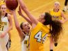 Ankeny's Sydney Shadravan (32) gets her shot blocked by Johnston's Taryn Knuth (44) on Tuesday, January 19, 2016, during a basketball game at Ankeny High School between the Johnston Dragons and the Ankeny Hawks.