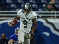 Detroit Cass Tech's Donovan Peoples-Jones (9) runs against Novi Detroit Catholic Central on Saturday, Nov. 26, 2016, at Ford Field in Detroit.