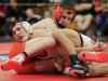 Kaukauna's Trent Leon, left, wrestles Oconto Falls' Kenton Peterson in the 132-pound championship bout at the Pulaski Invite on Jan. 28. Kaukauna has won three straight WIAA Division 1 state titles and will be in a different sectional this year.