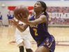 Male guard Ciaja Harbison drives to the basket in the Girls' LIT championship. 28 January 2017