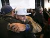 Centennial High defensive end and tight end Andrew Nichols hugs his youth football coach John Drago, after Nichols announced he will be attending Columbia University to play football during National Signing Day at Majerle's Sports Grill in Phoenix on Wednesday, February 1, 2017.